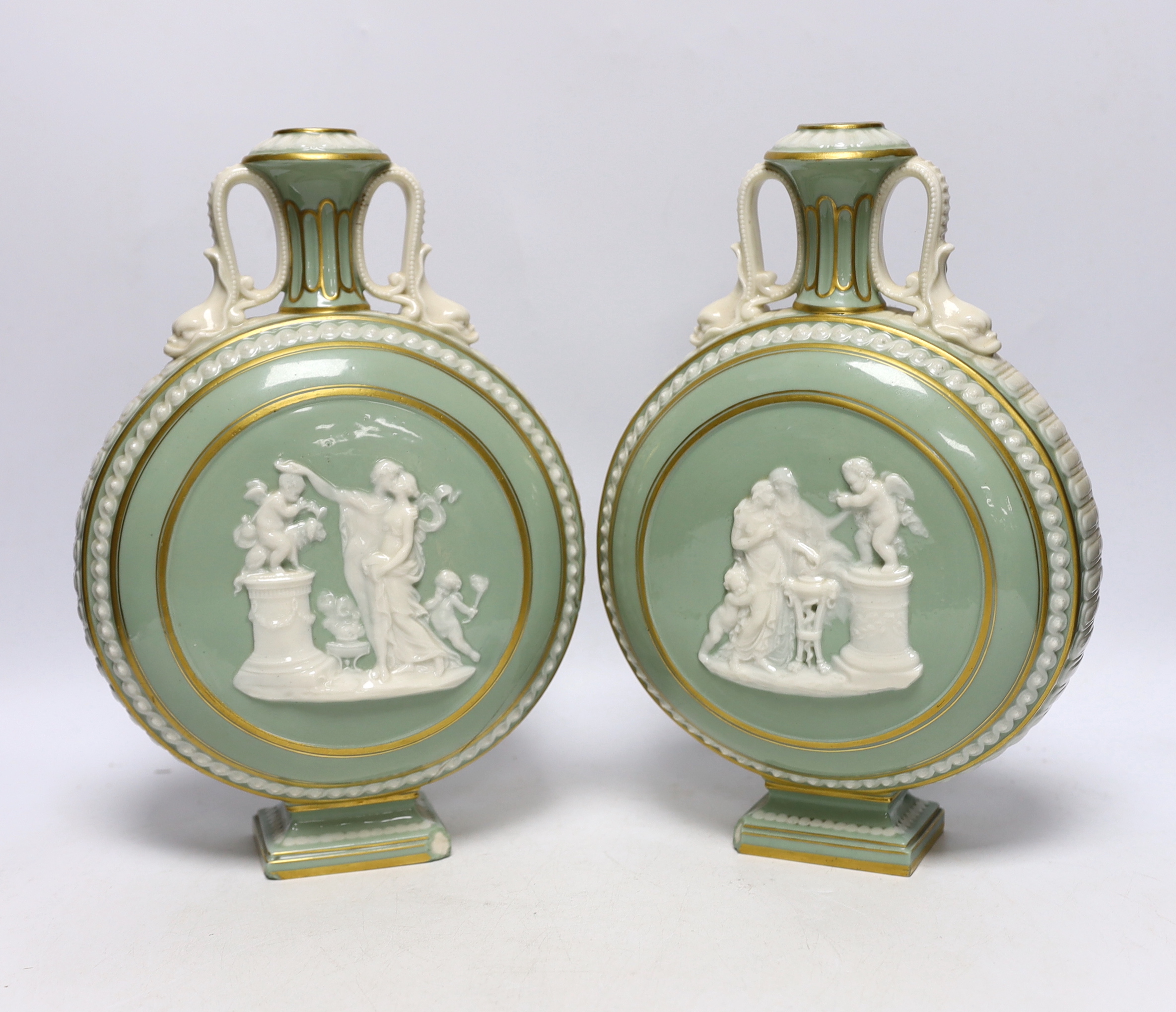 A pair of 19th century Continental moonflasks, decorated in relief and hand painted with butterflies, 28cm high